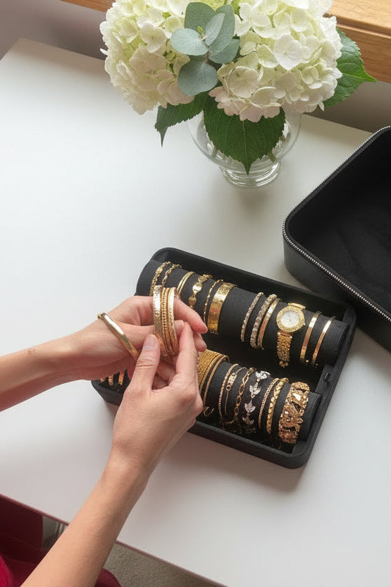 putting bracelets from jewelry organizer 